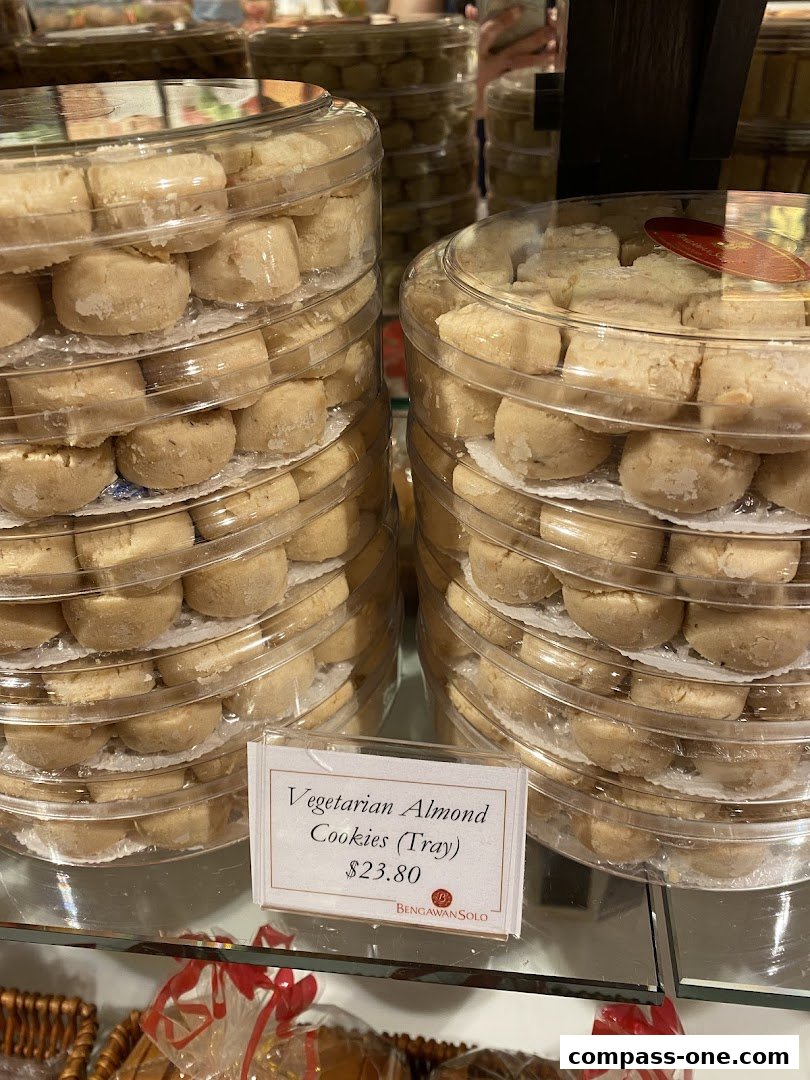 A display of vegetarian almond cookies in clear plastic containers at Bengawan Solo.