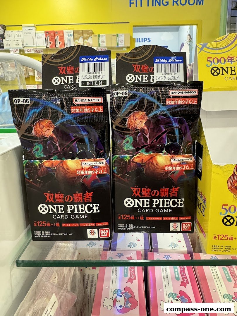 Packs of One Piece Card Game boosters are displayed at Kiddy Palace.