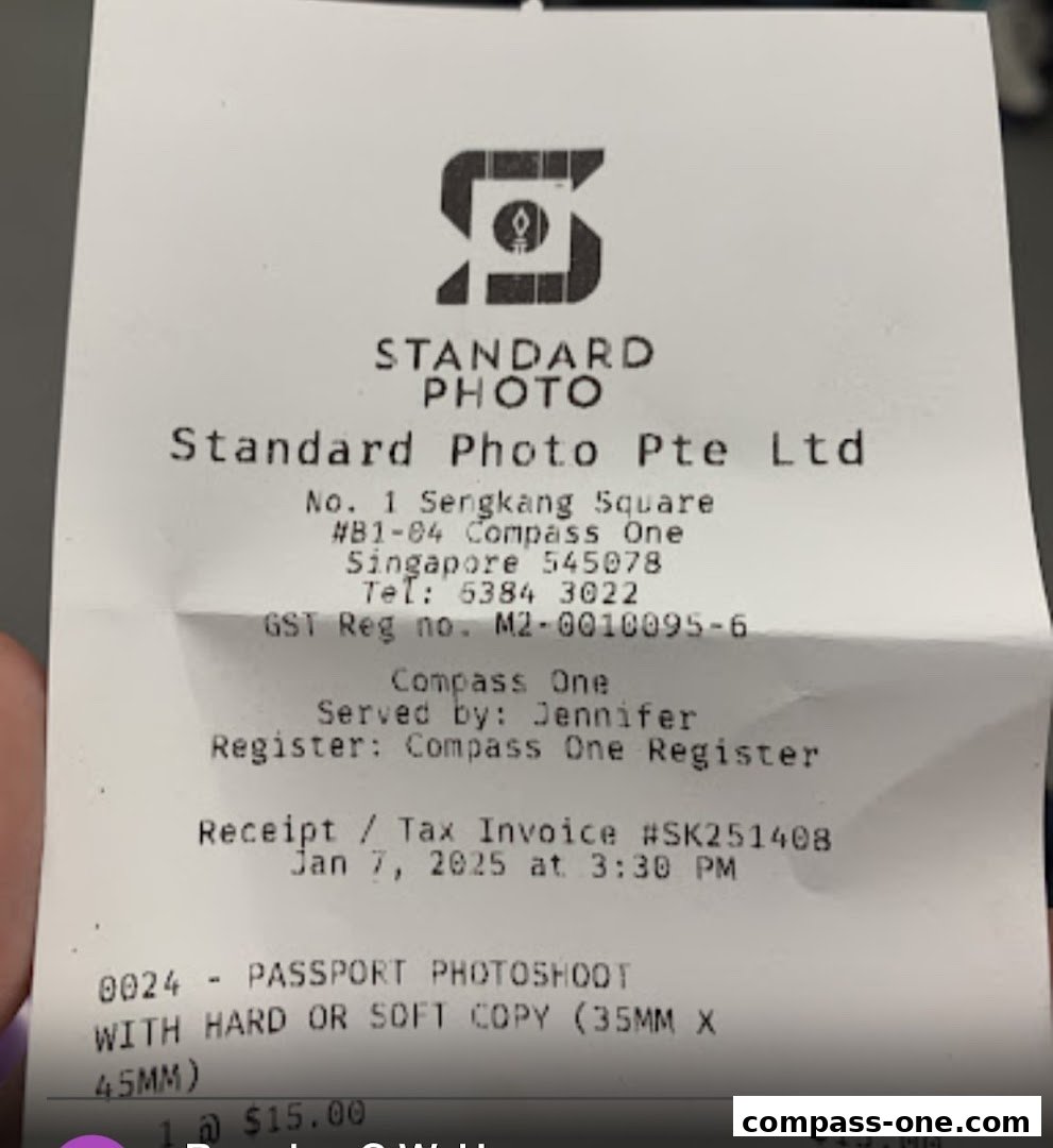A receipt from Standard Photo Pte Ltd for a passport photoshoot service.