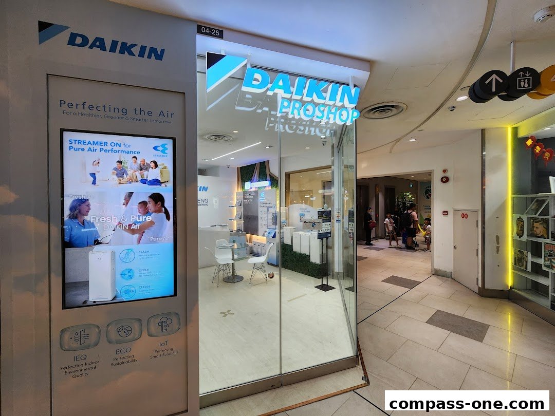 The Daikin Proshop by Poh Meng Engineering features a modern storefront with a digital display showcasing air purifiers.