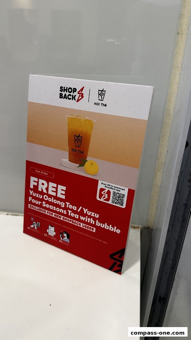 A promotional flyer for KOI Thé offering a free bubble tea for new ShopBack users.
