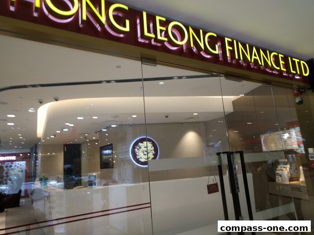 The entrance of Hong Leong Finance Ltd, a financial services company, with its prominent signage.