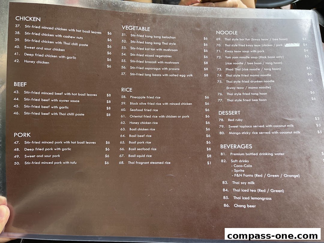 A menu from Nakhon Kitchen featuring Thai dishes like chicken, beef, pork, noodles, rice, desserts, and beverages.