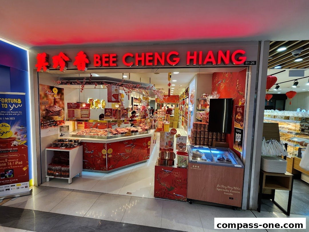 The exterior of a Bee Cheng Hiang shop, showcasing its products and festive decorations.