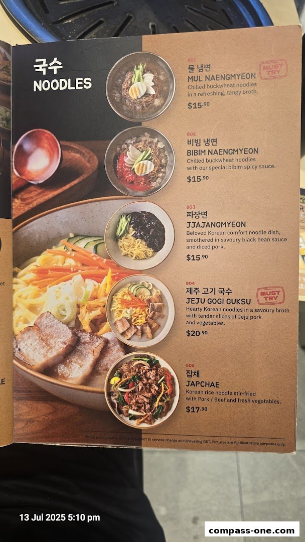 A menu showcasing various Korean noodle dishes with enticing descriptions and prices.