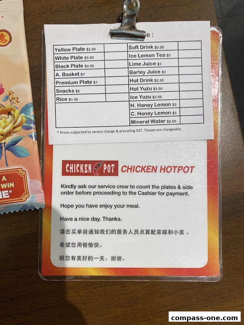 A menu from Chicken Hotpot Compass One listing plates, snacks, drinks, and ordering instructions.