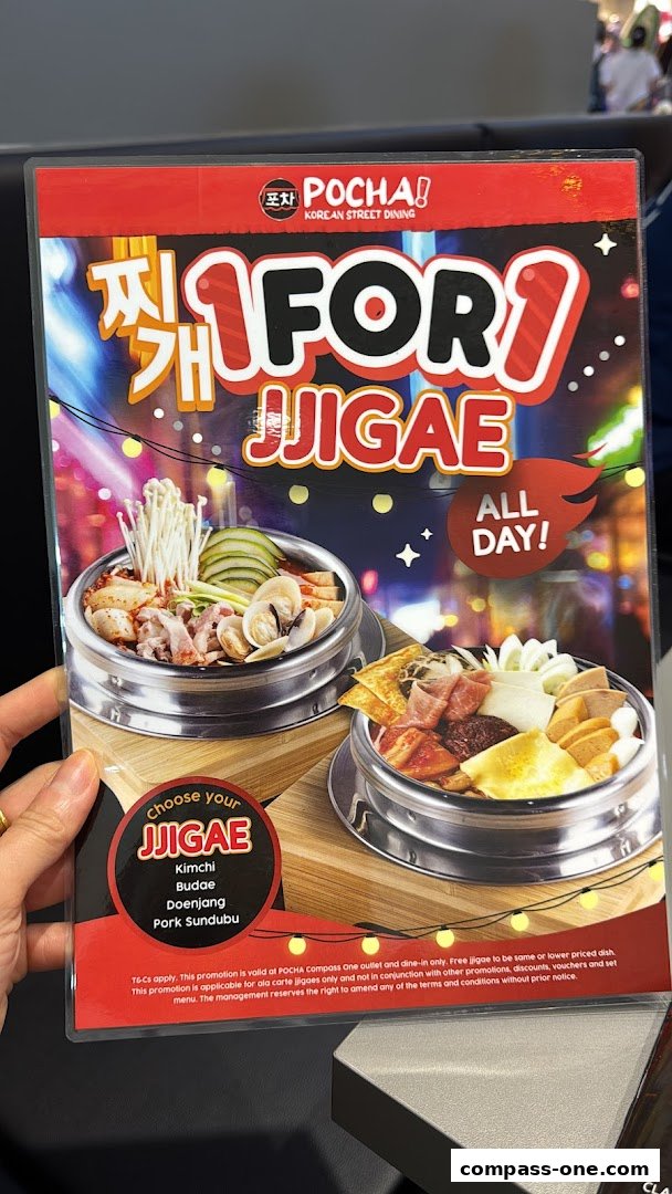 A promotional flyer for POCHA! Korean Street Dining featuring a 1-for-1 Jjigae offer.