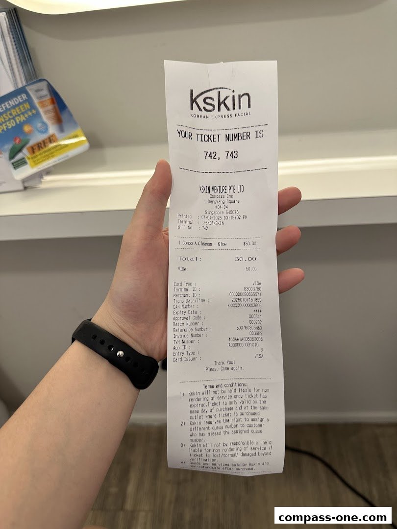 A hand holds a Kskin Korean Express Facial receipt with ticket numbers and transaction details.