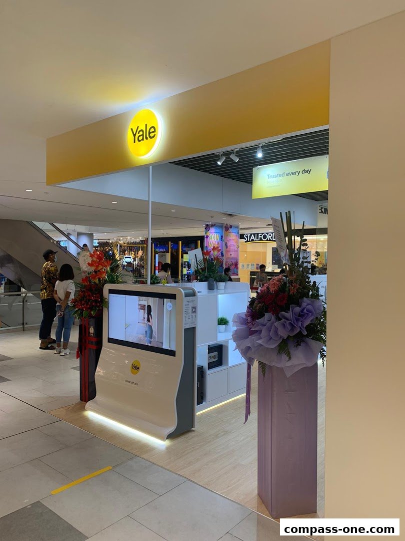The Yale Smart Shop Sengkang features a modern display with interactive screens and product showcases.