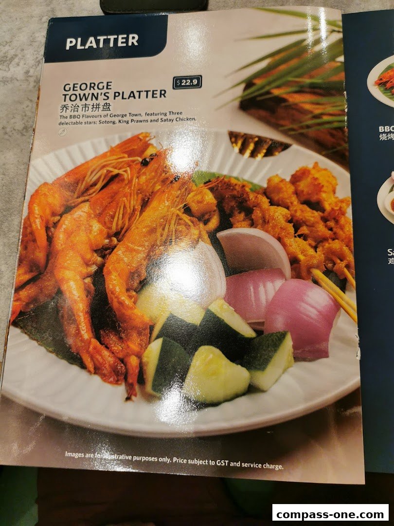 A menu featuring the George Town's Platter with prawns, satay chicken, and vegetables.