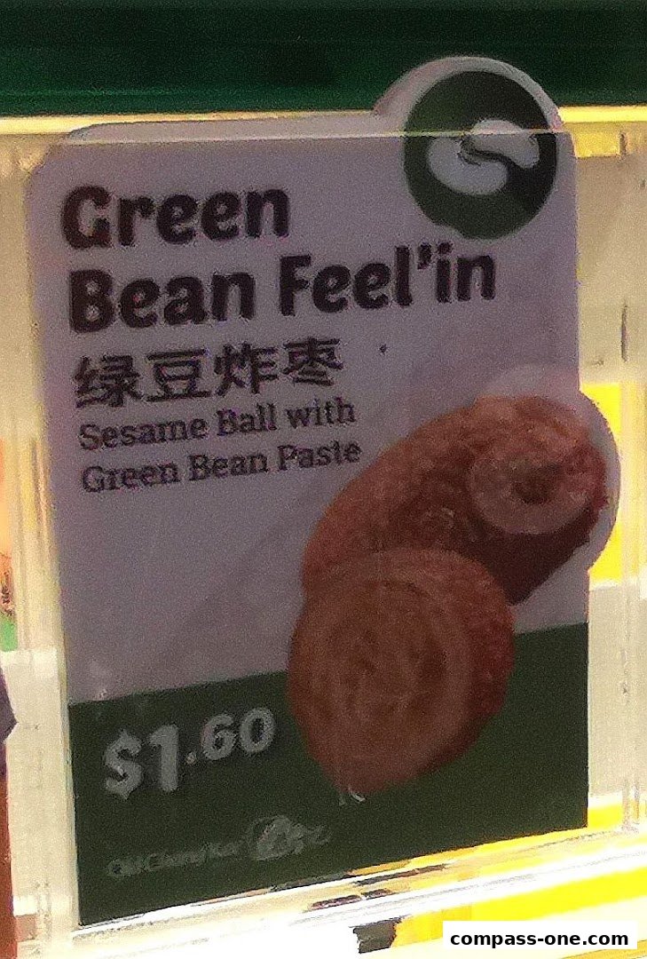 A sign displays a 'Green Bean Feel'in' snack with its price and ingredients.