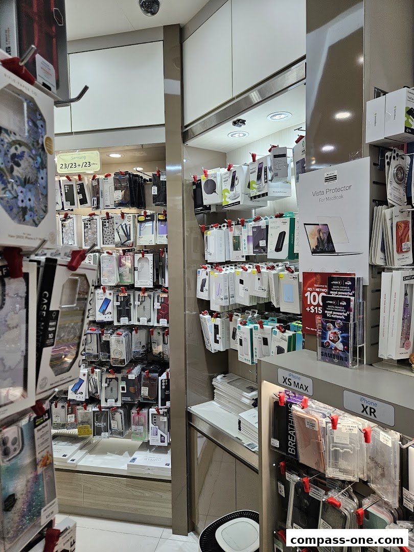A retail shop displaying a wide variety of phone cases and accessories for different phone models.