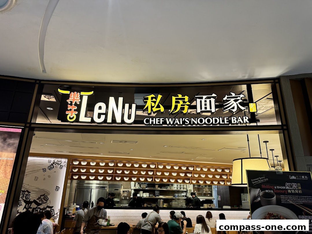 The exterior of LeNu Chef Wai's Noodle Bar with its prominent signage and interior visible.