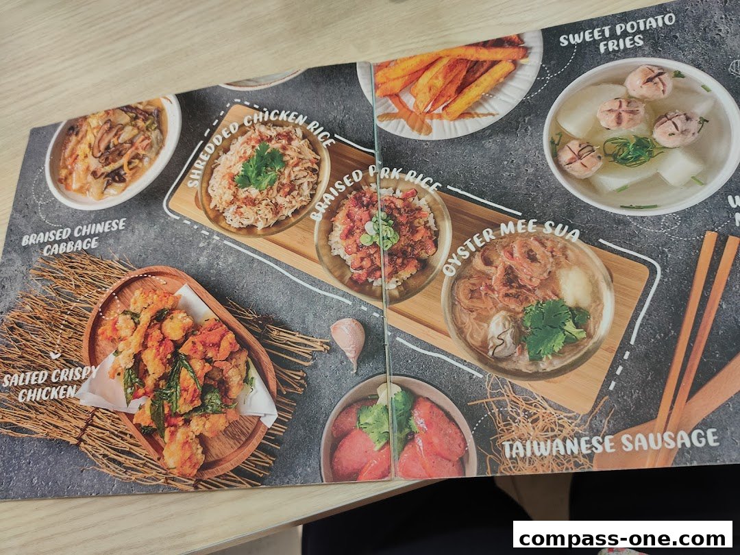 A menu featuring various Taiwanese dishes including chicken rice, oyster mee sua, and fried items.