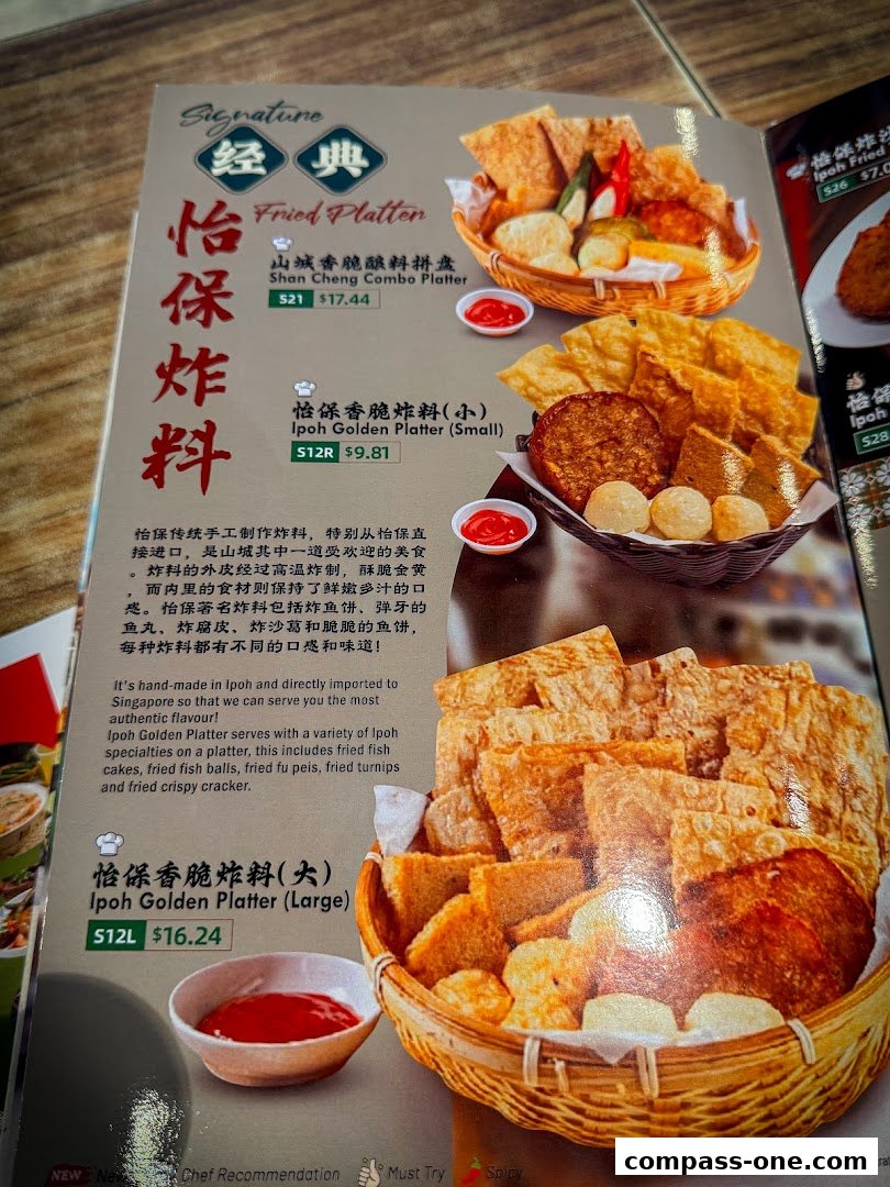 A menu page showcasing various Ipoh fried platters with descriptions and prices.