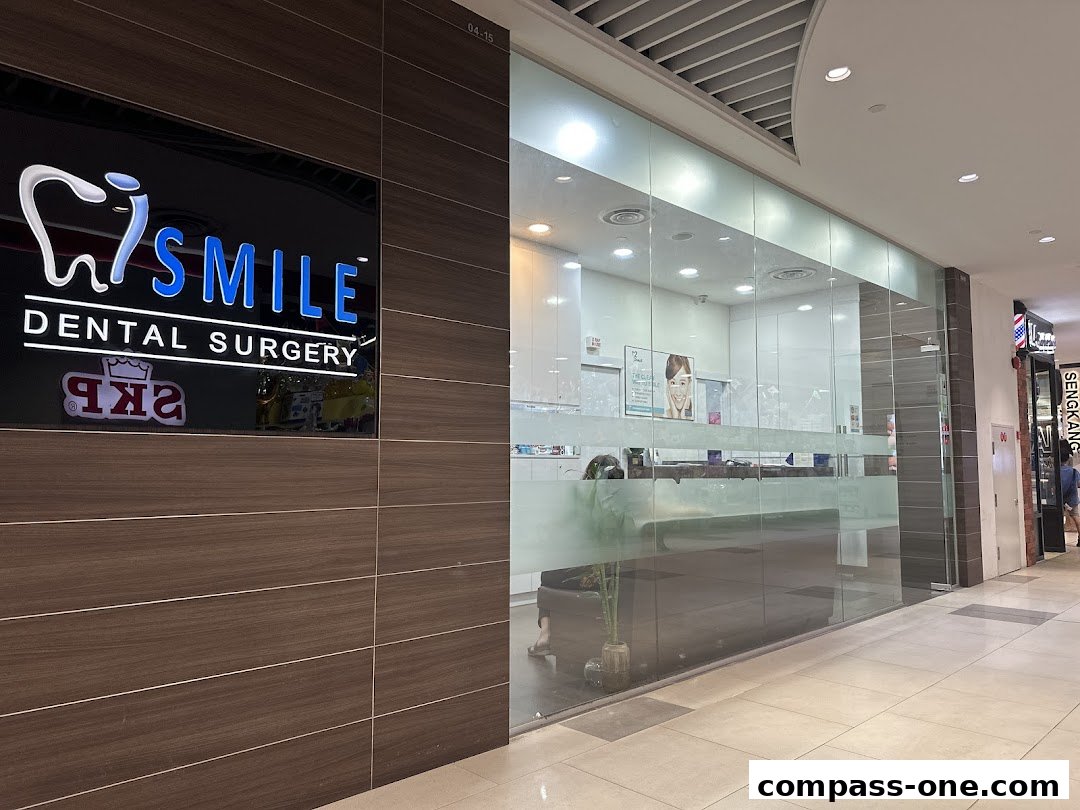 The exterior of iSmile Dental Surgery, featuring a modern sign and glass-fronted interior.