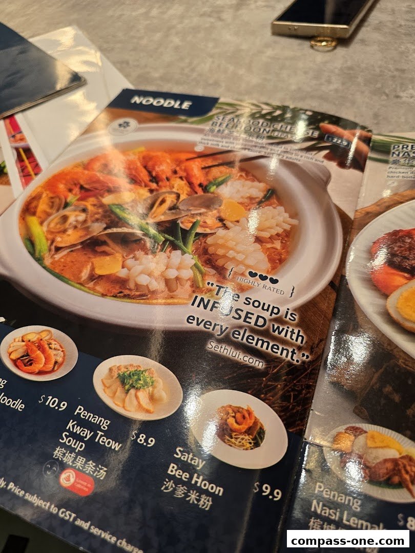 A menu from Penang Culture featuring various noodle dishes and other Malaysian cuisine.