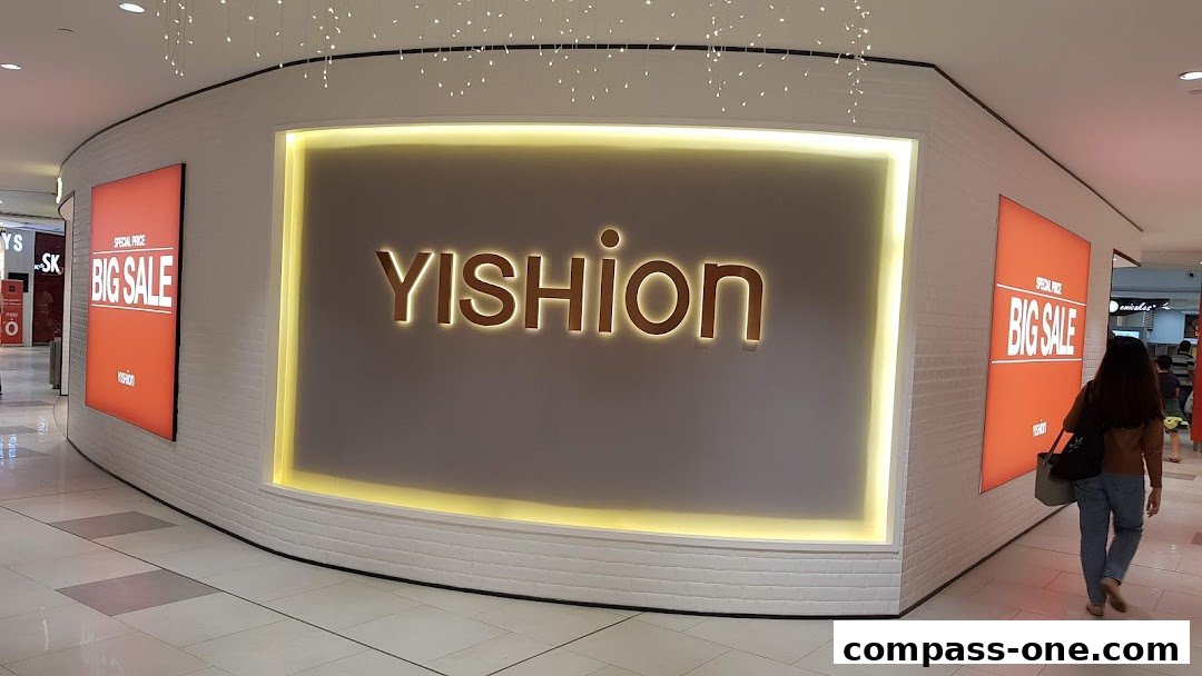 The YISHION store front with a large illuminated logo and 'BIG SALE' advertisements.
