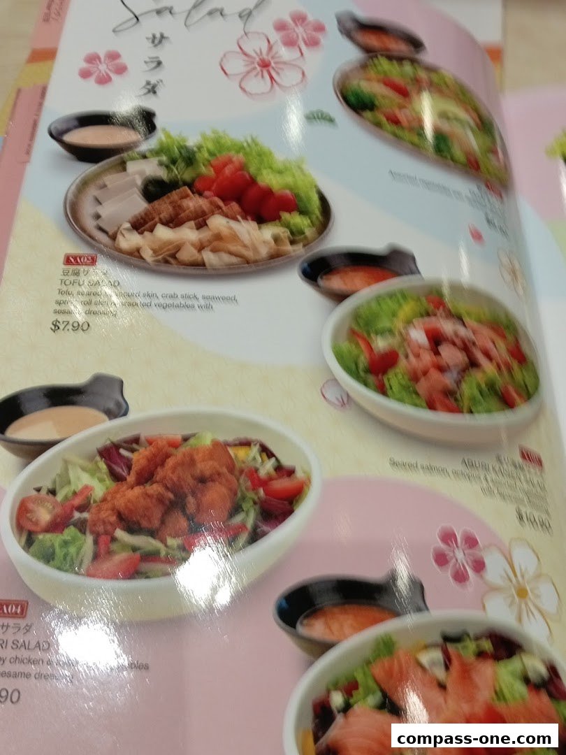 A menu page showcasing various salads with fresh ingredients and appealing presentations.