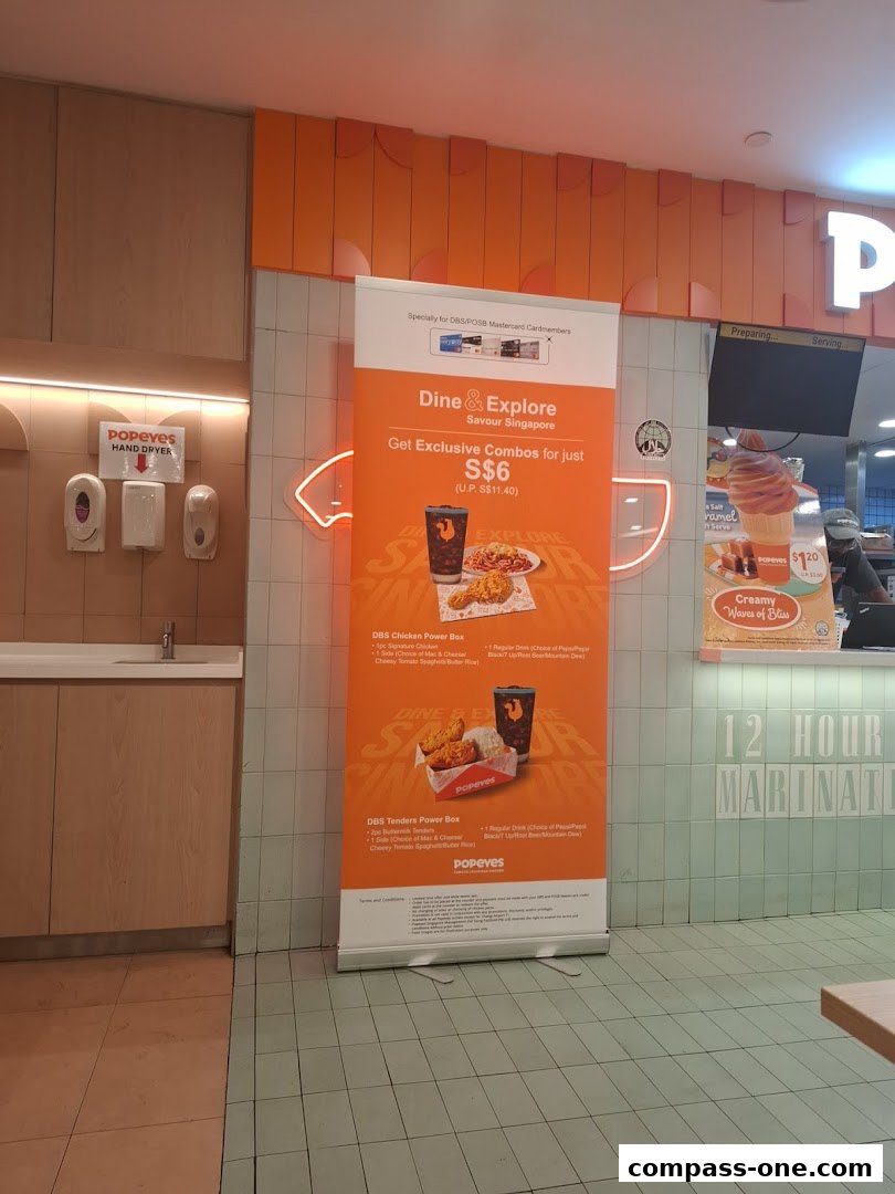 Popeyes restaurant with a promotional banner for exclusive combos and a sign about 12-hour marination.