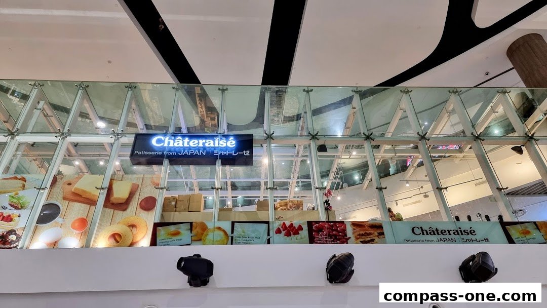 Châteraisé patisserie sign with images of cakes, pastries, and ingredients.