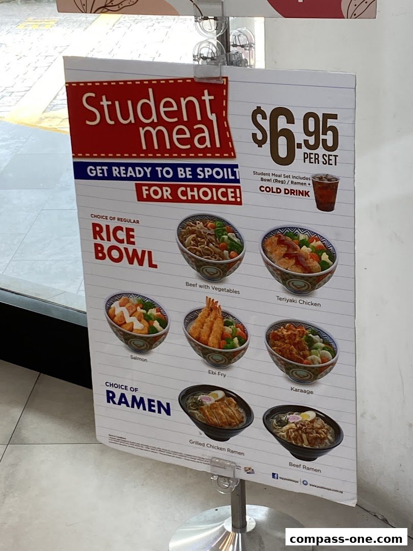 A sign advertising Yoshinoya's student meal deal with various rice bowls and ramen options.