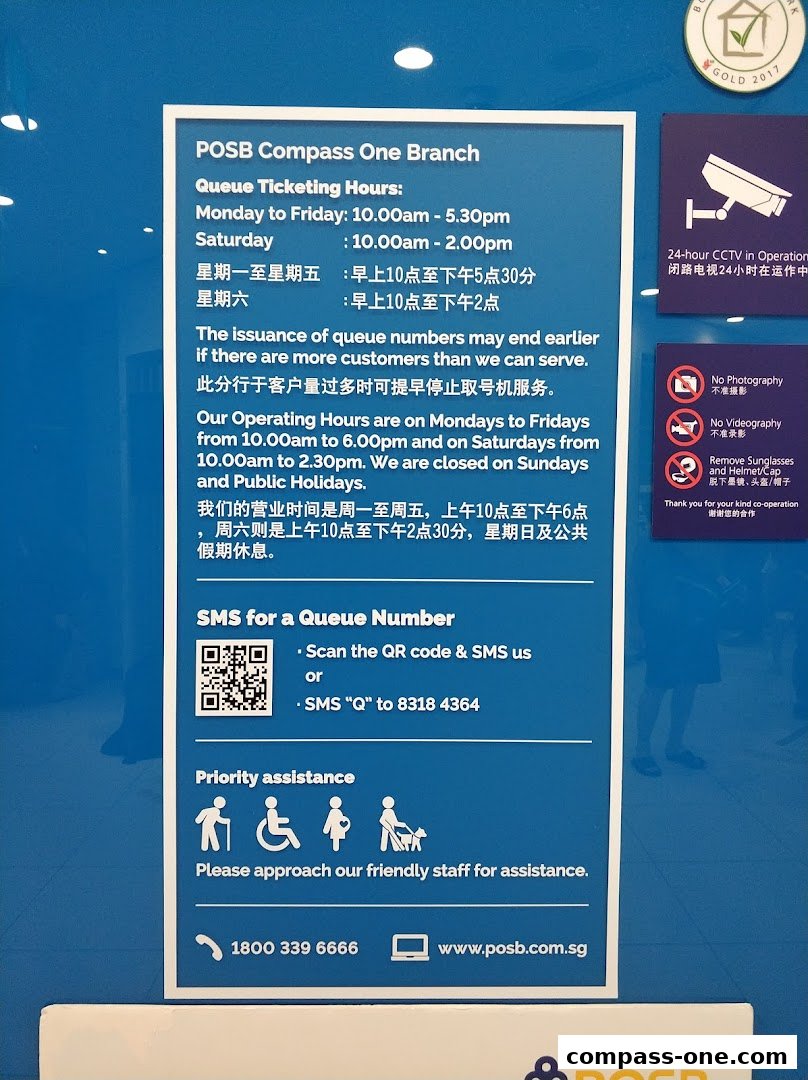 Information board for POSB Compass One Branch detailing queue ticketing and operating hours.