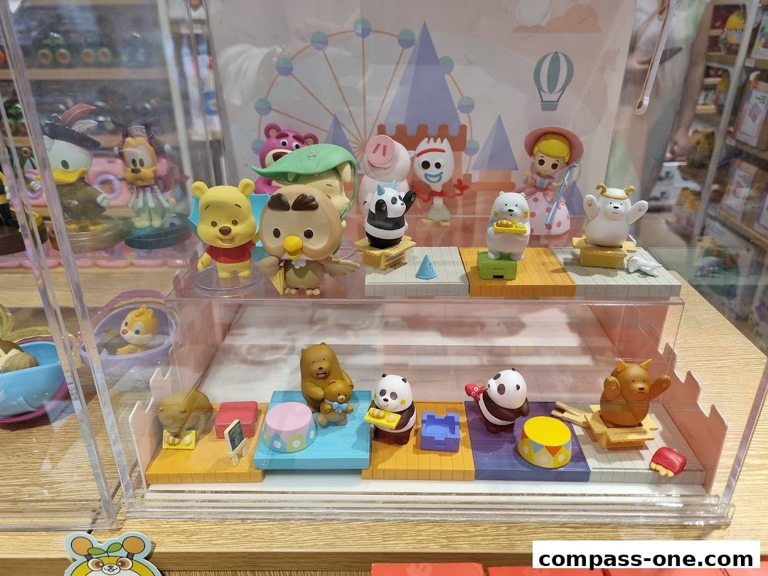 A display case filled with cute collectible figurines of popular cartoon characters.