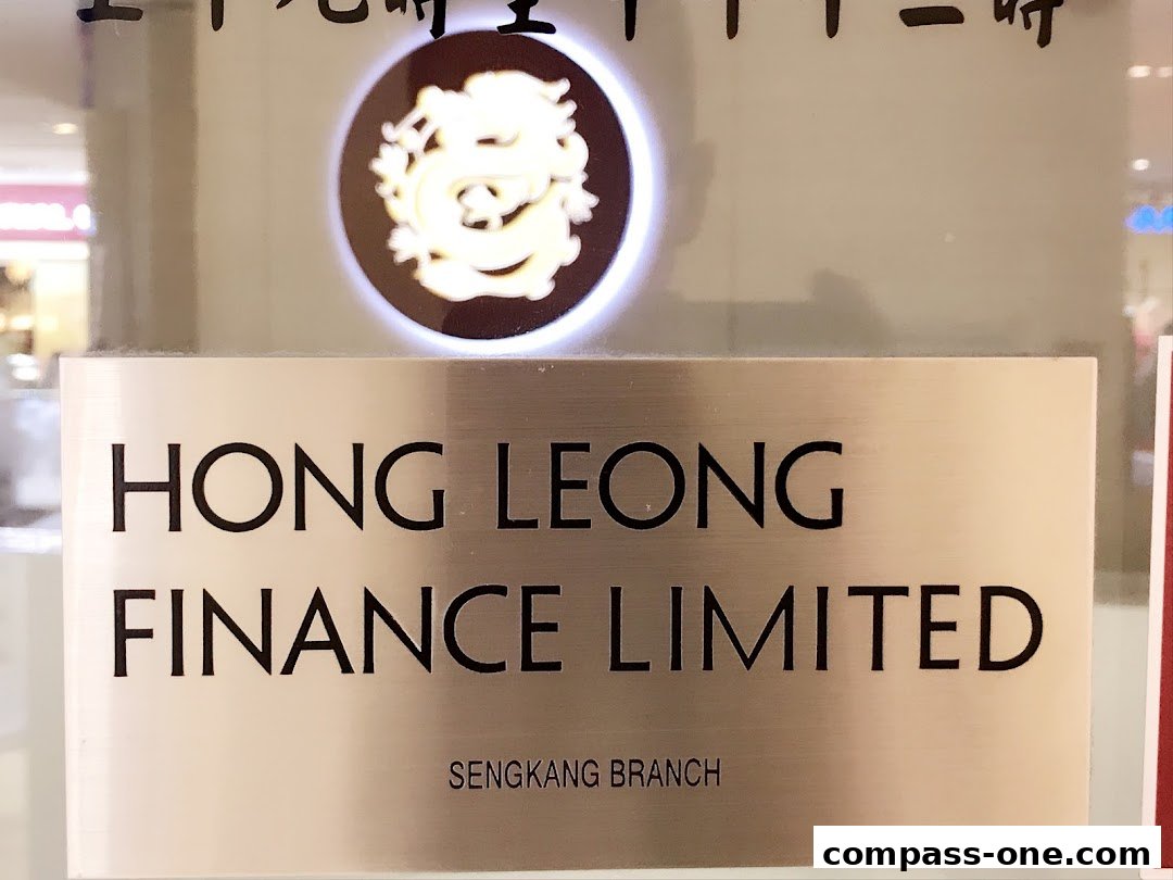 A sign for Hong Leong Finance Limited, Sengkang Branch, with a dragon logo.