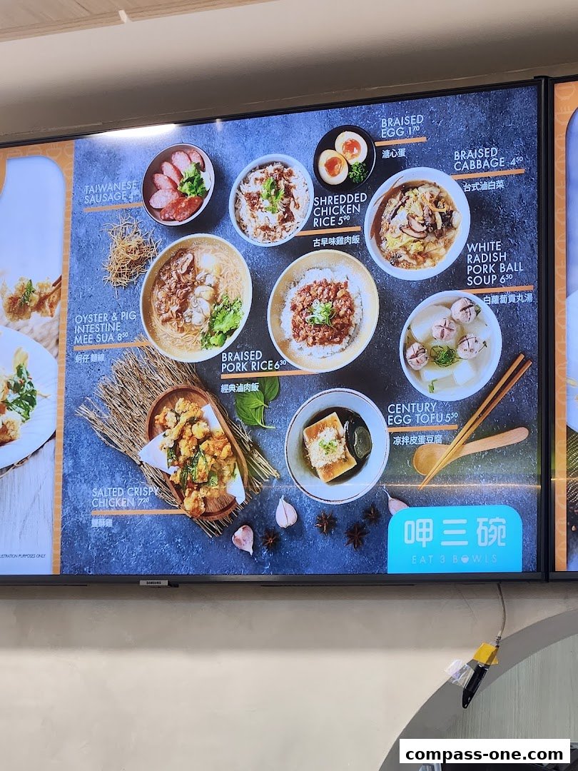 A digital menu board displaying various Taiwanese dishes with prices.