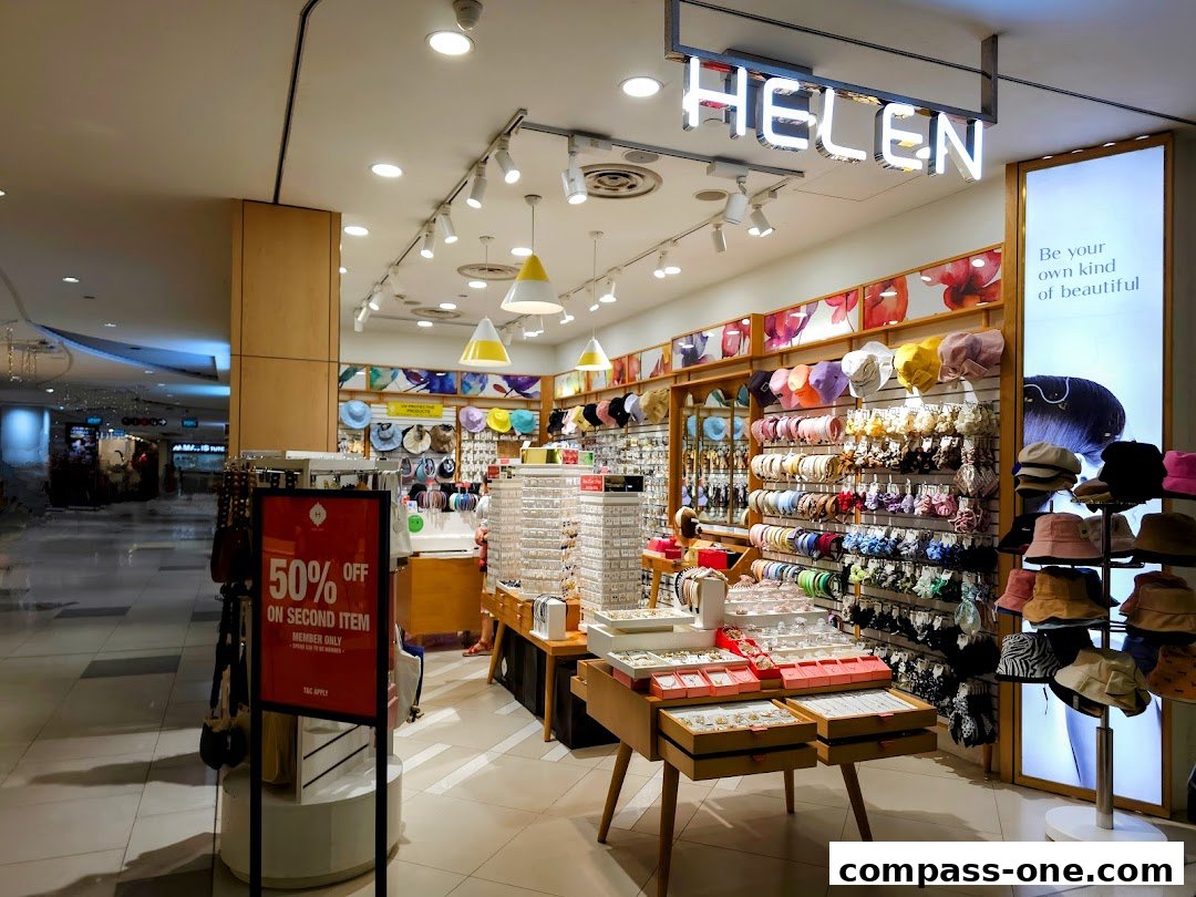 A brightly lit shop interior displaying a wide selection of hats, hair accessories, and jewelry.