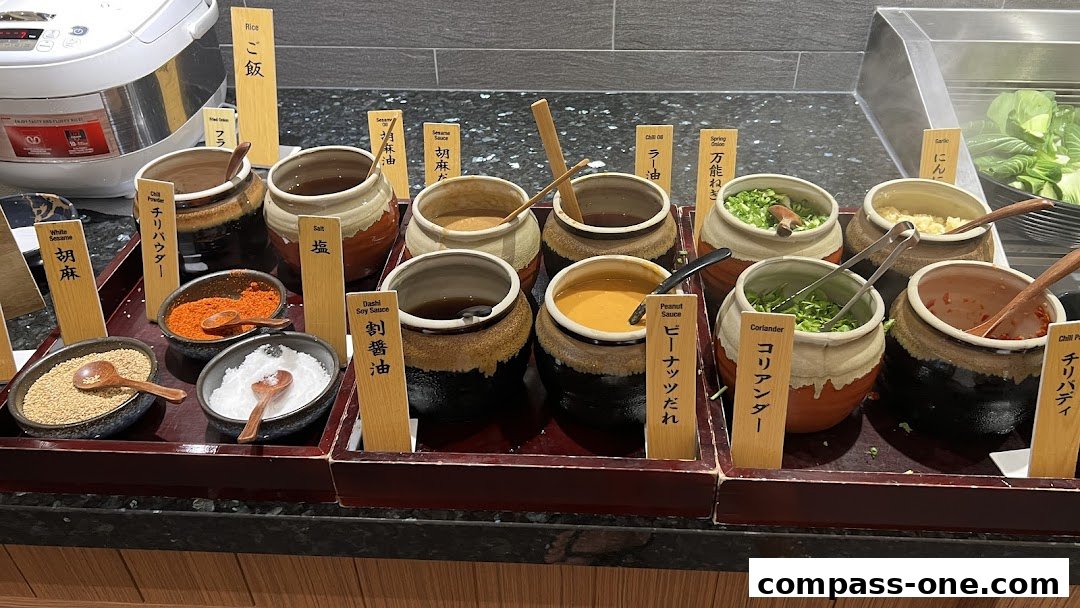 A variety of sauces and condiments are displayed in ceramic pots with wooden spoons.