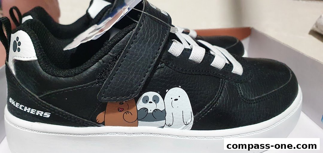 Close-up of black Skechers sneakers featuring a 'We Bare Bears' graphic print.