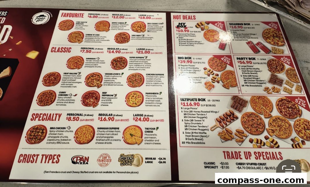 A Pizza Hut menu displaying various pizza categories, deals, and crust types.