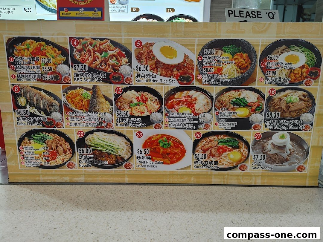 A colorful menu board displaying various Korean dishes with prices and descriptions.