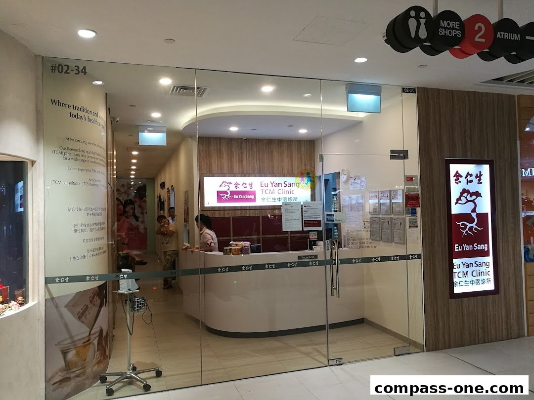 The entrance of Eu Yan Sang TCM Clinic with a reception desk and signage.