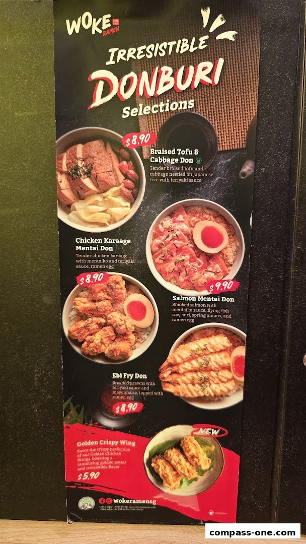 A menu featuring various Donburi selections and crispy chicken wings from WOKE Ramen.