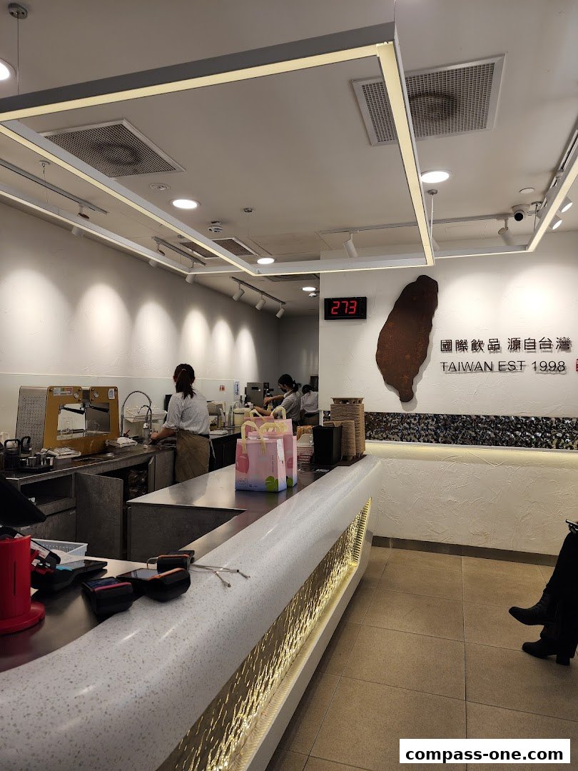 Interior view of a CHICHA San Chen bubble tea shop with staff preparing drinks.