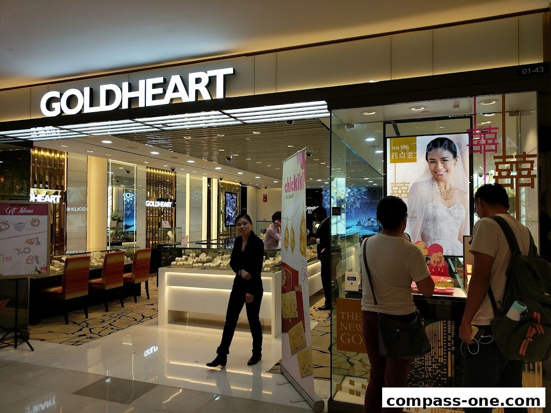 The Goldheart jewelry store features a well-lit interior with displays of jewelry and a large advertisement.