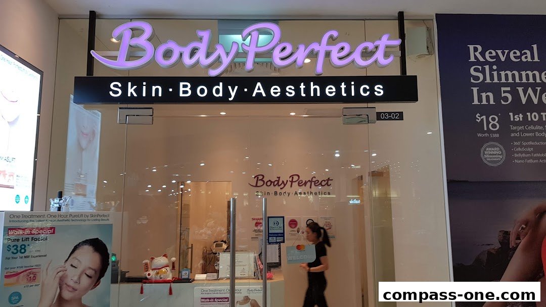 The entrance of BodyPerfect, a skin, body, and aesthetics shop, with promotional posters.