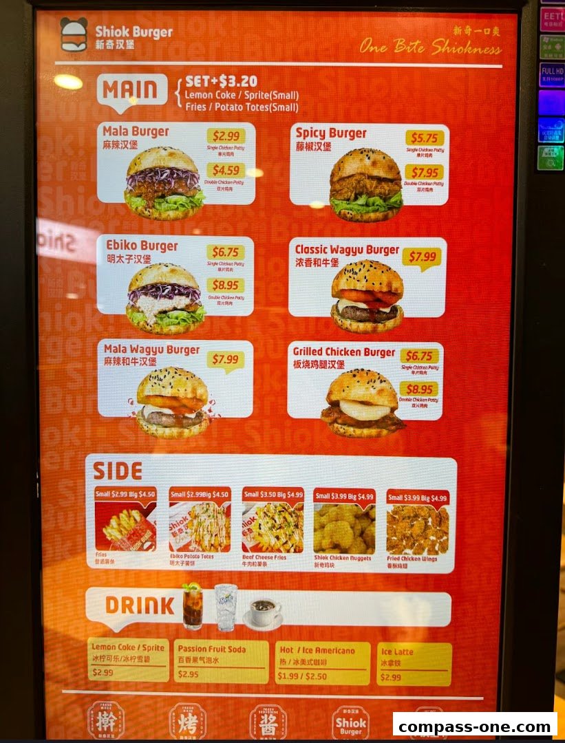 A digital menu board displaying various burgers, sides, and drinks from Shiok Burger.