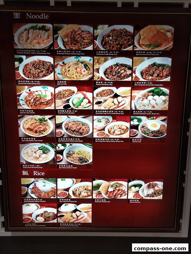 A menu board displaying various noodle and rice dishes with accompanying images.