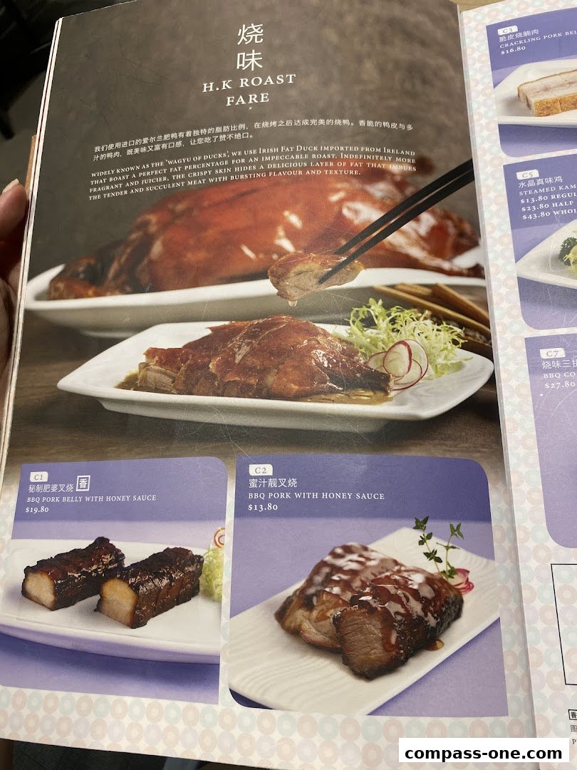 A menu page showcasing Hong Kong style roast meats, including duck, pork belly, and BBQ pork.