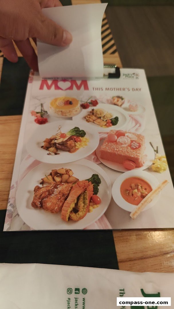 A Mother's Day menu from Jack's Place featuring various dishes and a cake.