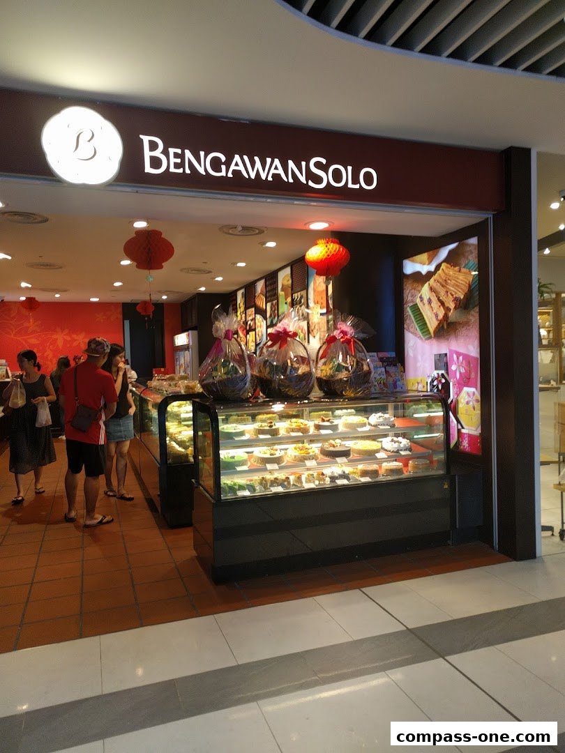 Bengawan Solo shop front with display cases filled with cakes and gift baskets.