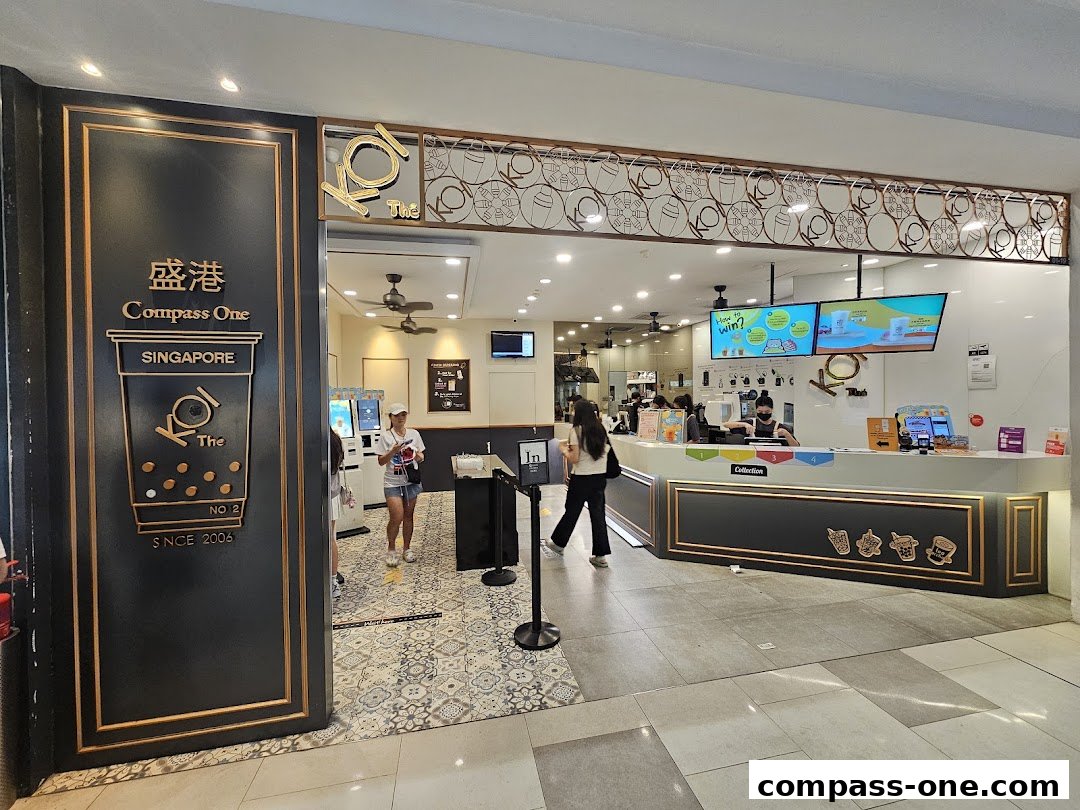 The entrance and counter area of a KOI Thé bubble tea shop.