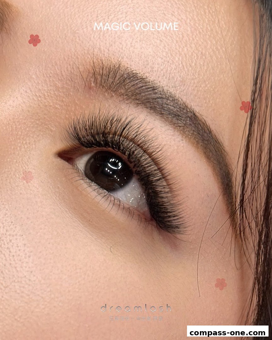 Close-up of a woman's eye with dramatic, voluminous eyelash extensions.