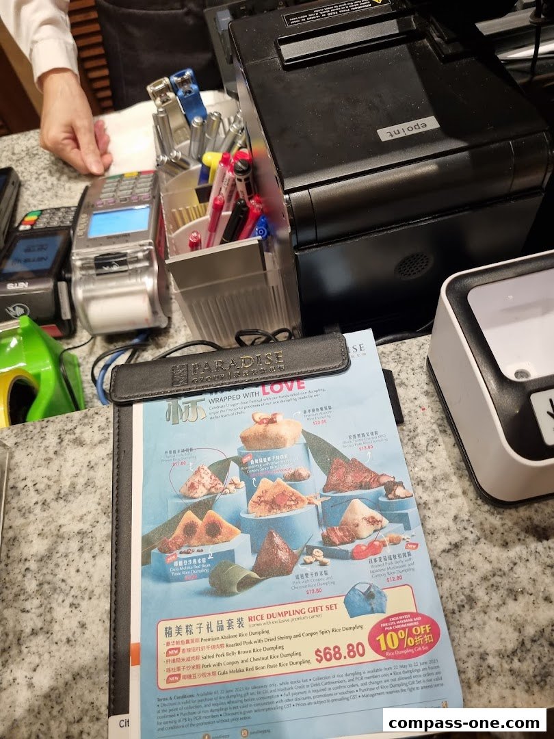 A menu featuring various rice dumplings with prices and a special offer.
