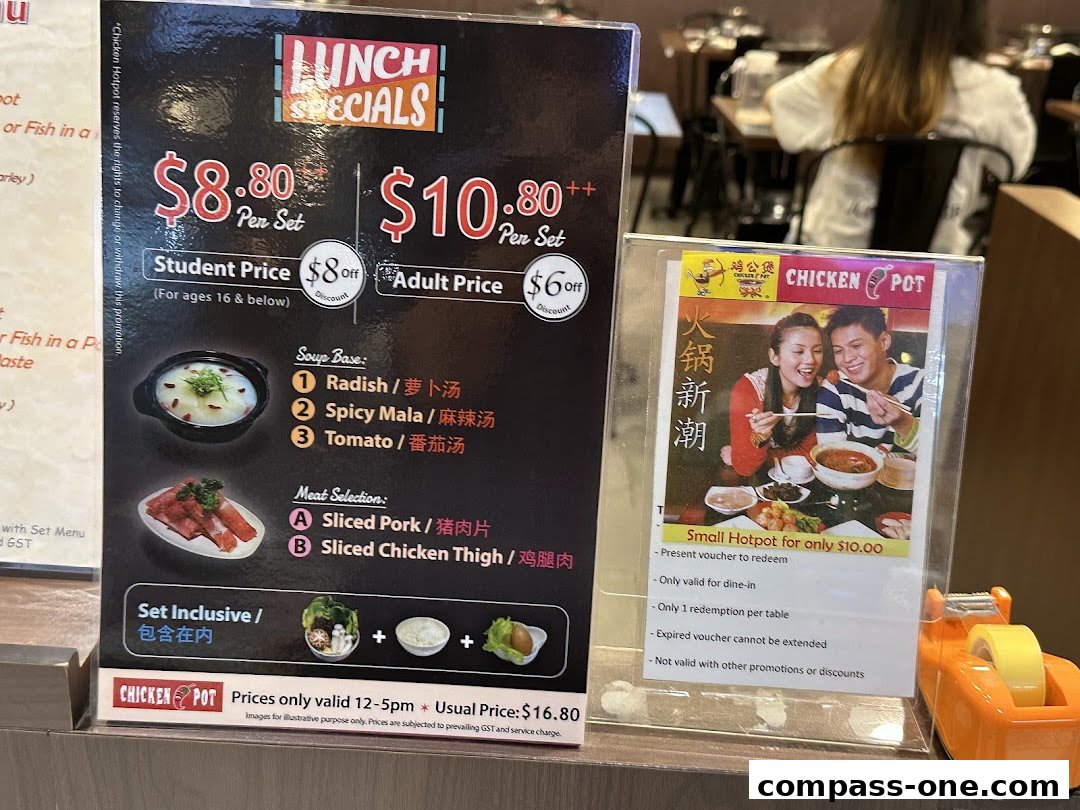 A menu board displaying lunch specials for hotpot, including soup bases and meat selections.