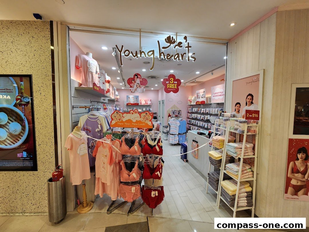 The entrance of a Young Hearts store displaying apparel and accessories.
